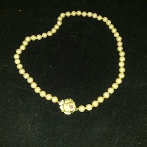 Vintage pearl necklace with rose clasp